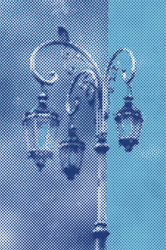 An ornate street lamp in two blues